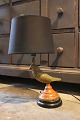 Decorative, old 
table lamp in 
the shape of a 
small bird ...