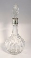 Carafe with 
silver mounting 
(830). Height 
34 cm. ...