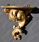 Rococo shelf in 
gilded wood, 
19th century.