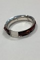Bracelet in 
Sterling Silver 
decorated with 
pieces of amber