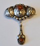Danish Art 
Nouveau brooch 
in silver with 
amber, 20th ...