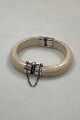 Ivory Bracelet 
with Sterling 
Silver Hinges