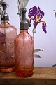 Decorative, rare French mini glass siphon from the beginning of the 20th century 
in pink colored glass... Decorative, rare French mini glass siphon from the beginning of the 20th century 
in pink colored glass...