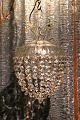 Old "bag" prism 
ceiling lamp 
with glass 
shade and 
chains ...