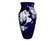 Royal 
Copenhagen
Tall dark blue 
vase with apple 
blossom