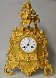French gilded 
mantel clock, 
early 19th 
century.