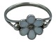 A. Dragsted silver
Enamel ring with white flower from the 1950