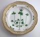 Lundin Antique 
presents: 
Royal 
Copenhagen. 
Flora Danica 
plate w. 
open-work 
border. 
Diameter 25 cm. 
Model 3553. ...