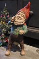 Antique 
terracotta 
gnome with old 
paint and a 
fine patina...