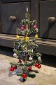 Antique 
miniature 
Christmas tree, 
 decorated with 
lots ...