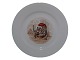 Antik K 
presents: 
Royal 
Copenhagen 
Christmas
Side plate 
with gnome and 
cat 17.2 cm.