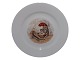 Antik K 
presents: 
Royal 
Copenhagen 
Christmas
Side plate 
with gnome and 
cat 17.2 cm.