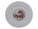 Antik K 
presents: 
Royal 
Copenhagen 
Christmas
Side plate 
with gnome and 
cat 17.2 cm.