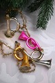 K&Co. presents: 
Old 
Christmas tree 
ornament in the 
shape of 
Christmas 
trumpets 
in thin glass 
from around 
1920...