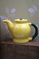 K&Co. presents: 
Rare 
Ursula faience 
teapot with 
handle from 
Royal 
Copenhagen...
