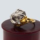 Antik 
Damgaard-
Lauritsen 
presents: 
Julia 
Plana; Ring of 
18k gold and 
white gold, set 
with diamonds