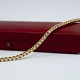 A tennis bracelet in 18k gold set with diamonds