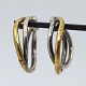 Antik 
Damgaard-
Lauritsen 
presents: 
Anette 
Kræn; Pair of 
ear rings in 
silver and 
gilded silver