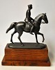 Pegasus – Kunst 
- Antik - 
Design 
presents: 
Galster, 
Johan G.C (1910 
- 1997) 
Denmark: 
Equestrian 
figure of King 
...