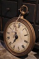 K&Co. presents: 
Decorative 
old wooden 
"clock" from a 
watchmaker's 
shop with old 
paint and a 
really nice 
patina.