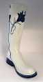 Lundin Antique presents: Royal Copenhagen. Large porcelain boot with blue Megamalet. Height 36 cm. The white ...