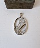 Karstens Antik presents: Hugo Green silver pendant decorated with lily of the valley