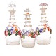 Aabenraa Antikvitetshandel presents: Set of three enamel decorated carafes circa 1860-80. H: 19-23cm