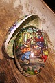 Old vintage Easter egg in papier-mâché with a motif of ...