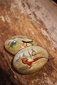 Old wooden Easter egg with painted peacocks from the ...