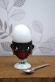 K&Co. presents: Old egg cup from the 1930s in porcelain with a painted funny face.