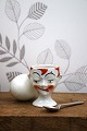 K&Co. presents: Old egg cup from the 1930s in porcelain with a painted funny face.