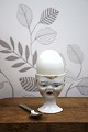 K&Co. presents: Old egg cup from the 1930s in porcelain with a painted funny face.