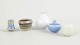 L'Art presents: Set of five miniature ceramic bowls and vases.