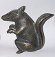 Figure of a squirrel in bronze.