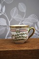 K&Co. presents: Mocca cup (without saucer) in Flora Danica frame produced by Royal Copenhagen...