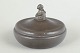 L'Art presents: Chr. R. Kunst tin, lidded bowl with figural finial.