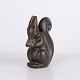 Osted Antik & Design presents: Knud Basse Squirrel Figure in Dark Ceramic with Nut, Danish Design, 1960s