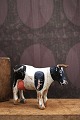 K&Co. presents: Decorative, old dairy cow in carved wood with fine original painting, horns and tail in leather...