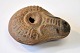 Antique Roman oil lamp. Ancient times.