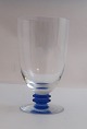 Lundin Antique presents: Attica, Royal Copenhagen with blue deco. Design Anja Kjär. Water glass. Height 11.5 cm.