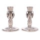 Aabenraa Antikvitetshandel presents: Pair of Georg Jensen Blossom sterlingsilver candlesticks #2. H: 10,5cm. W: ...