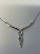 Antik Huset presents: Necklace with pendant, with inlaid diamonds, in 14 carat white gold.
