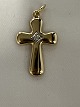 Antik Huset presents: 14 carat gold pendant, Cross with a zircon.Stamped: JAa 585.