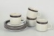L'Art presents: Arabia Karelia, set of four tea cups with matching saucers.