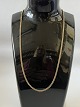 Antik Huset presents: Faceted armor chain in 14 carat gold, stamped 585. Length 44 cm.