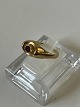 Antik Huset presents: Ladies Ring 14 carat with red stone.Size: 57.