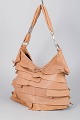 L'Art presents: Yves Saint Laurent, St. Tropez leather shoulder bag.