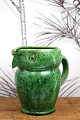 K&Co. presents: Old "Lillerrød" owl jug in glazed earthenware in fine green glaze with fine patina...