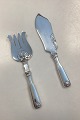Danam Antik presents: Mussel Fish Serving Flatware in Silver