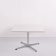 Coffee table by Arne Jacobsen and Piet Hein with white ...